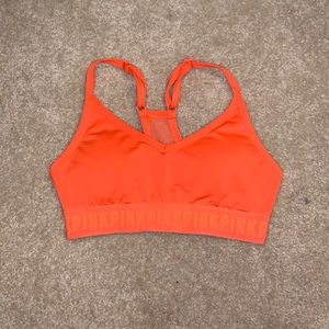 Pink- neon orange sports bra
